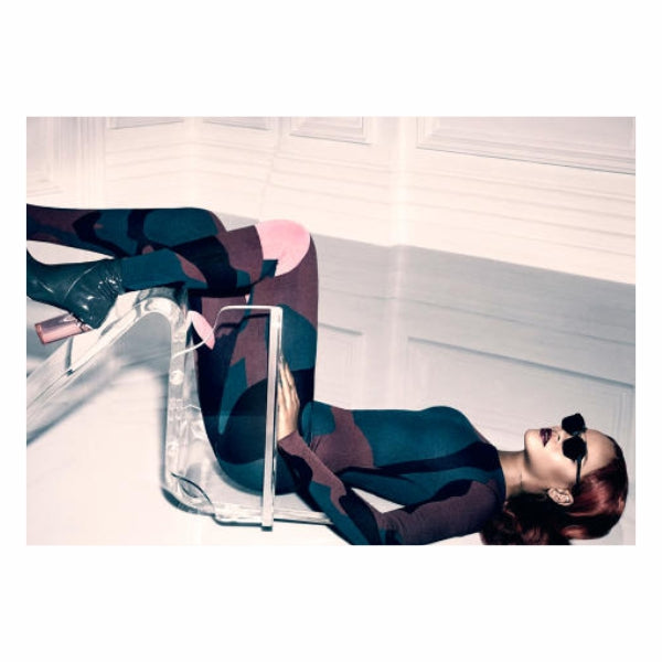 Rihanna Laying On Chair