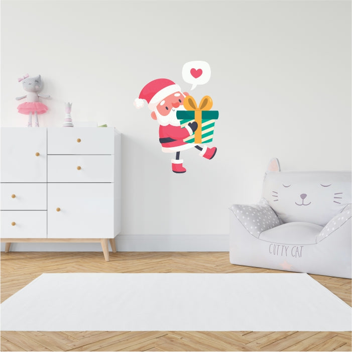 Santa Clause Carrying Present Decal